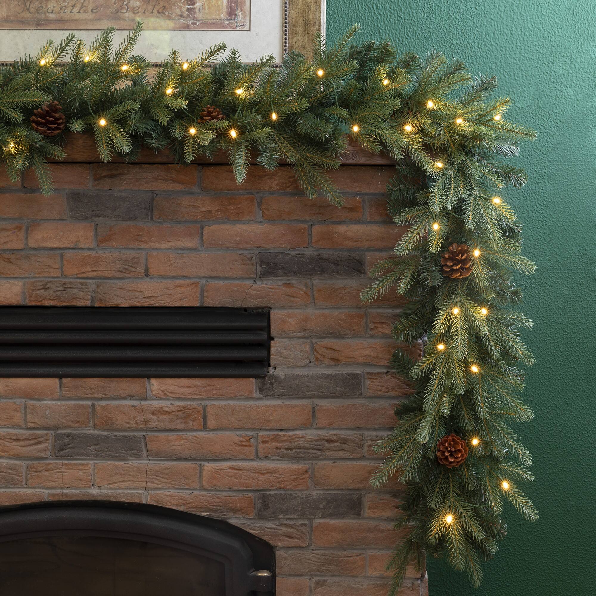 Glitzhome® 9ft. LED Greenery Pinecone Christmas Garland with Timer